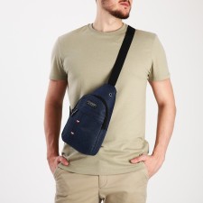 Male sling bag from textiles, headphone opening, blue color