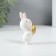 Souvenir Polystone "Easter rabbit Little white with a gold egg" 4.5x3x8 cm