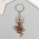 Metal keychain "Snake with rhinestones" mix 5.5x2 cm