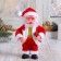 Santa Claus "with a candle and a gift/bell" 16 cm, mix
