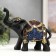 Polystone souvenir "Black elephant with color patterns on the blanket" 16x17.5x7 cm