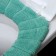 Soft cover on the lid and seat of the toilet (green)
