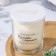 A candle in a glass flavored "bun with cinnamon", 7x7 cm, 27 hours