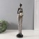 Polystone souvenir "African in a dress with leaves, with a pot" White with black 8.5x8x39 cm