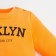 Set: jumper and pants crumb I "NY", height 80-86 cm, orange color/black