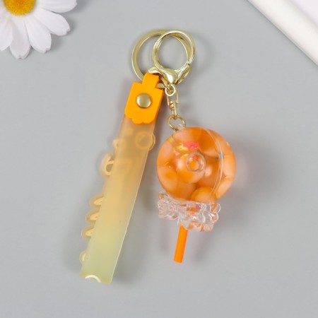 A plastic keychain with a carbine, a strap "Orange" water "water with decor1.8x5.3x5.6 cm-3