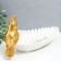 Souvenir Polystone stand "Golden parrot with a crest on a white sheet" 11x24.5x11 cm