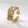 Ring Metal "Tren" is crumpled, the color is gold, dimensionless