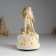 Souvenir Polystone Music "Santa Claus in a brown fur coat with a Christmas tree" 10x10x18 cm
