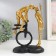 Polystone souvenir "Kiss, pair, monocycle and balloon" Gold 26x17x11 cm