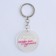 Acrylic keychain with a joke "is difficult to be modest", diam. 4.5 cm