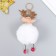 Fluffy on the ring "Deer in the New Year's cap" d = 8 cm
