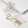 Gift bag "hearts" are small, 9 × 11, white color with gold