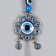 Suspension from the evil eye "Flower - Eyes and hearts" 21 cm mix