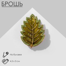 Alkha's “leaf” brooch, green color in matte gold