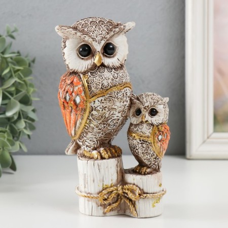 Polystone souvenir "Gray eagle owl with brown wings, with a stump of hemp" 16.8x9.5x5 cm