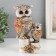 Polystone souvenir "Gray eagle owl with brown wings, with a stump of hemp" 16.8x9.5x5 cm