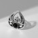Ring of "ethnic" drop, black color in black silver, dimensionless