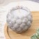 Candle "Shar" in the candlestick with spherical faces of gypsum, 8x7cm, marble with black stripes