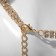 The necklace "Burleske" hanging crystals, colored in gold, 30cm