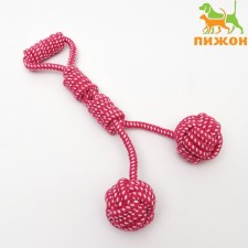 A rope toy with a pen and balls 