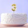 Candle for the cake, the number "3", gold.