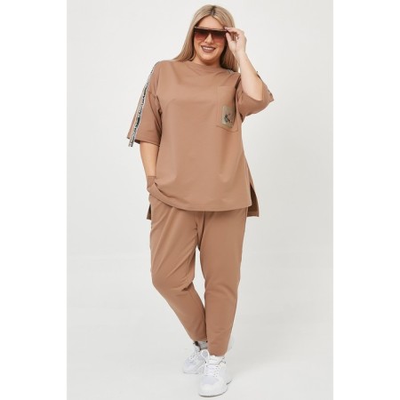 Female suit, size 60, beige color