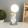 Table lamp "Cosmonaut with moon" 1x40W E14 white/gold 12.5x12.5x31cm
