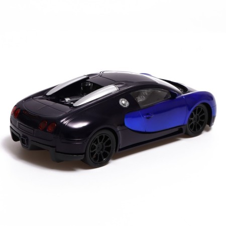 The radio -controlled "coupe" machine includes pedal and steering wheel, works on batteries, the color is blue-2
