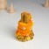 Polystone souvenir "Orange snakes with flowers on coins" 6x5.8x8.8 cm