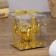 Glass 1 candle "Pattern", golden color