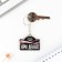 A wooden key point "in business", 5 x 3.5 cm