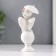 Polystone souvenir "Snowty angel in a pink wreath, on a ball under an umbrella" 8.5x3.8x3 cm