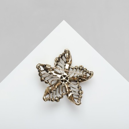 Brooch "Flower", green color in black gold-1
