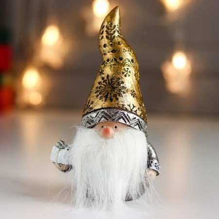 Polystone souvenir "Grandfather Frost in a gold cap, with a gift" 14.5x7x8.5 cm