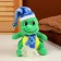 Soft toy "Dragosh", in a blue cap, 15 cm, green color