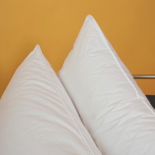 The pillow is tall threeX -chamber, size 50x70 cm, color mix