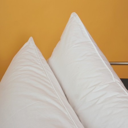 The pillow is tall threeX -chamber, size 50x70 cm, color mix