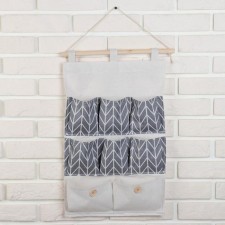 Suspendor Organizer with the pockets of the Zigzag shares, 8 departments, 35 × 53 cm, the color is gray.