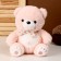 Soft toy "Bear", with a bow in peas, 26 cm, pink color