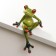 Souvenir Polystone varnish on the frog's shelf sits 14.8x9.5x5.5 cm