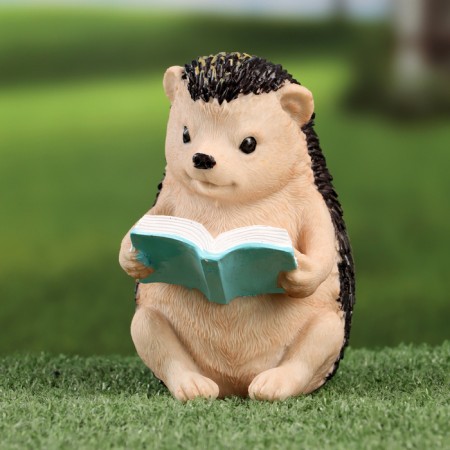 Garden figure "Hedgehog reads the book" 10x9x14cm-1
