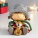 Polystone souvenir "Girl in a gray cap with a deer" 7.5x8.5x9.5 cm