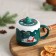 Ceramic mug with silicone lid of the Santa Claus, 380 ml, green color