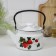 The kettle is cylindrical, 1.5 l, induction, neckline mix, white color