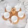 A set of ceramic saucers on a wooden stand "Estet", 5 objects, white color