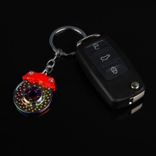 Cartage keychain, brake disk, metal, mother -of -pearl