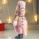 Interior doll "Girl in pink overalls and in pink cap" 49x8x14 cm