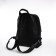 City backpack, textura made of artificial leather with zipper, outer pocket, black color