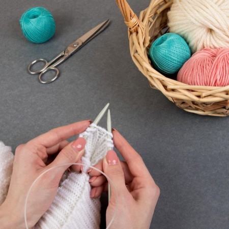 The knitting needles are circular, for knitting, with Teflon coating, with plastic fishing line, D = 5 mm, 14/80 cm-2